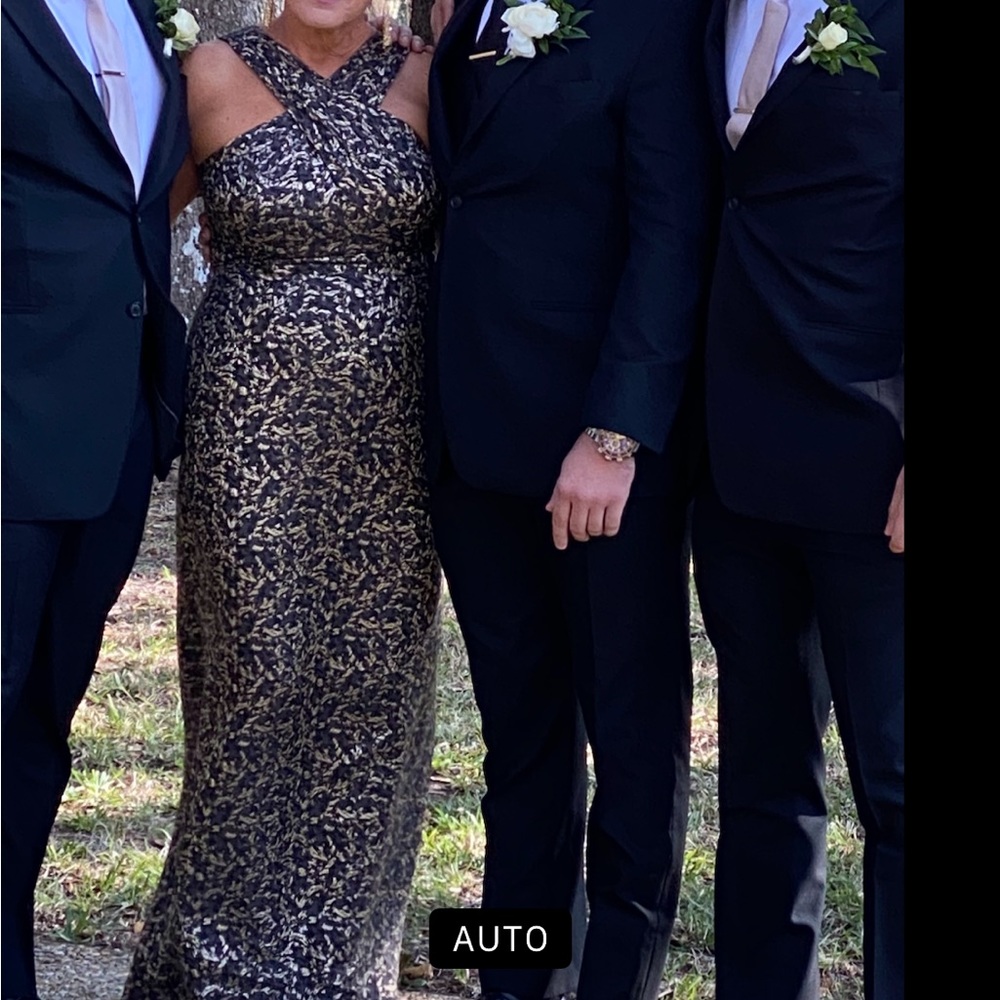 Stunning black/gold gown criss cross top. Great for wedding/black tie affair